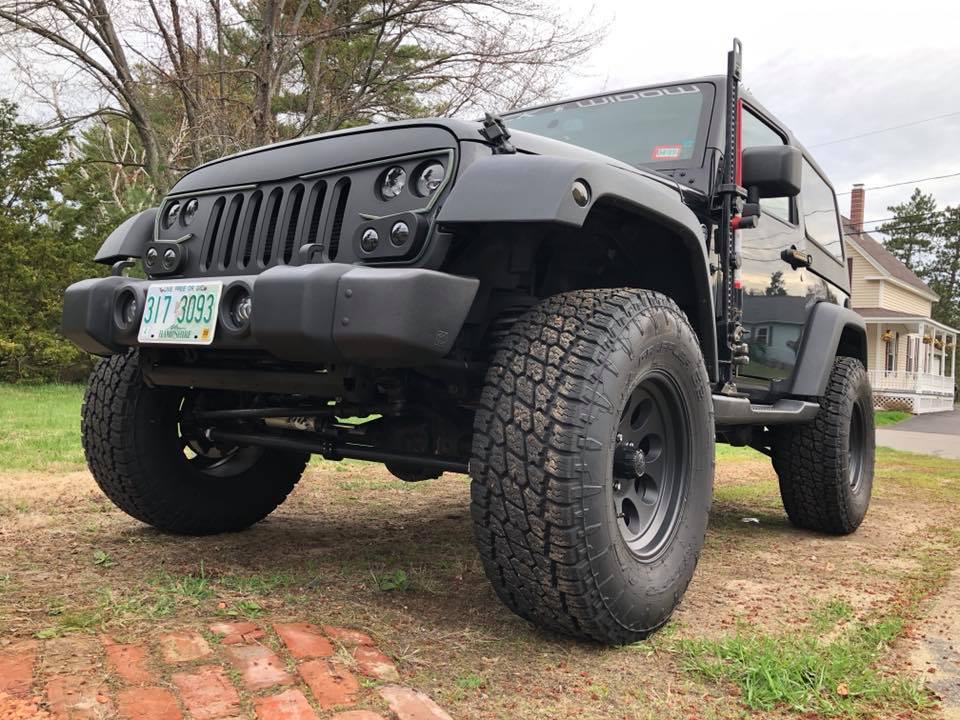 Custom blacked-out Jeep Wrangler — MYATT Enterprises Mobility Platform